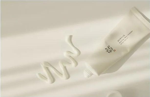 Écran solaire quotidien coréen au riz + probiotiques SPF50+ pour éclat et teint terne